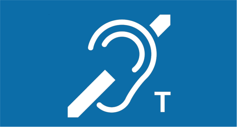 Pictogramme bleu apposé à l'entrée : une oreille barrée accompagnée de la lettre T - AUDITION BELLECOUR Lyon 2ème